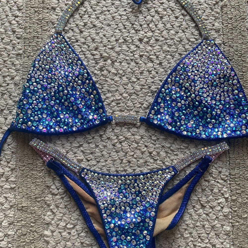 NPC bikini suit worn once. In great condition. Top is a B cup & small bottoms